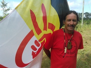 Gregory Payne with AIM flag