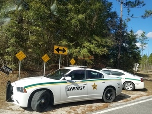 Suwannee County Sheriff cars at closed SRSP gate, 30.3783555, -83.1655342