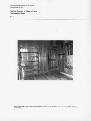 [Photo 22: Interior of the Hebard Cabin - kitchen, looking northwest {I on Map 6]. The closed door leads to the pantry (ONWR, Jeff Aicher, October 1994).]