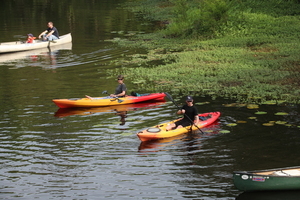 [Twin color kayaks: Nikki York and Jay York]