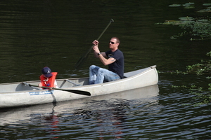 [Diverse age pair paddlers]