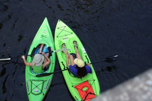 [Two green kayaks]