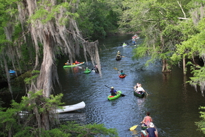 [Another blue kayak coming in from the left]