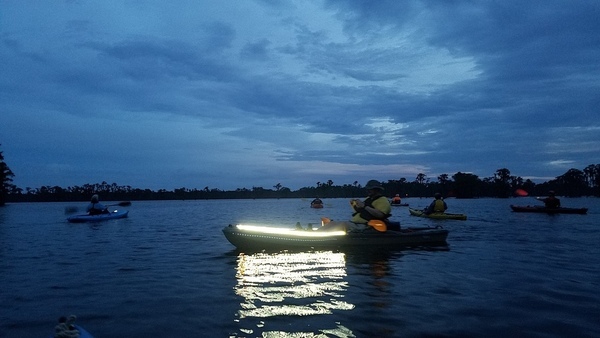 [Paddling Banks Lake with lights at dusk]