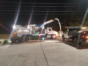 [Power lines and Valdosta Utilities equipment]