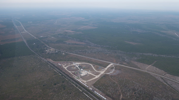 WNW: Chip Mill and mine site, ONWR on horizon, 30.516737, -82.081989