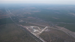 [WNW: Chip Mill and mine site, ONWR on horizon, 30.516737, -82.081989]