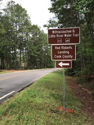 [Westbound road signs]