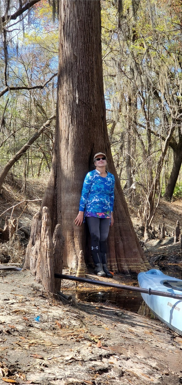 Gretchen and a cypress tree, 10:53:26, 30.5638652, -82.7250035