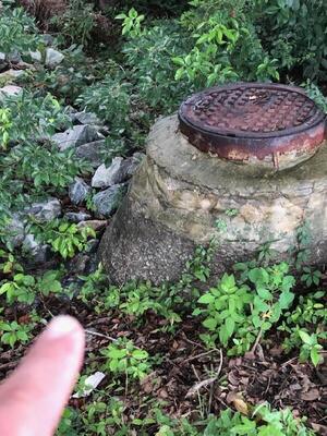 [Manhole 2 across Baytree Road]