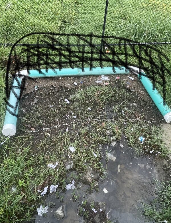 [Net sketch. Perhaps the trash trap can be modified and fitted with something to prevent the trash from following up and over the boom and into the pond.]