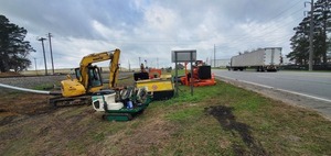 [Bypass pump and Valdosta, A City Without Limits sign on US 84, 2023:02:28 09:15:27, 30.8433993, -83.2446536]