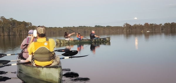 [Moon in cloud and canoes]