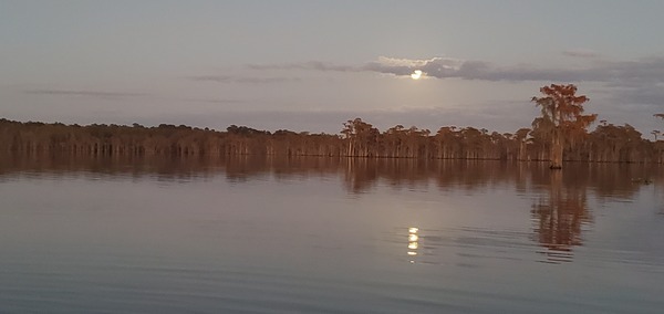 Moon below cloud