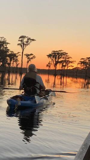 [Suwannee Riverkeeper into the sunset, Banks Lake Full Hunters Moon --Lisa Adkins Montisano]