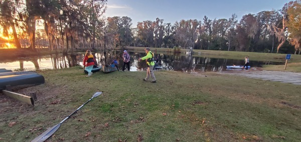 [Holly Jones herds the paddlers to the water]