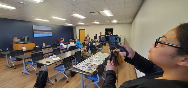 Samantha Carr videoing