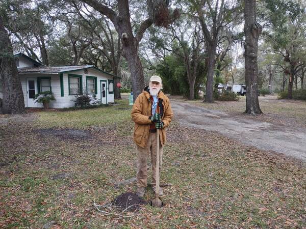 jsq with the posthole digger --Richard Fowler