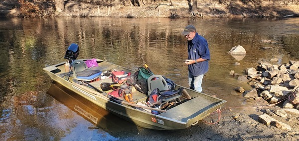 [TJ Johnson with the boat full of gear at Troupville Boat Ramp, 2024-10-26, 10:04:11, 30.8516307, -83.3479699]