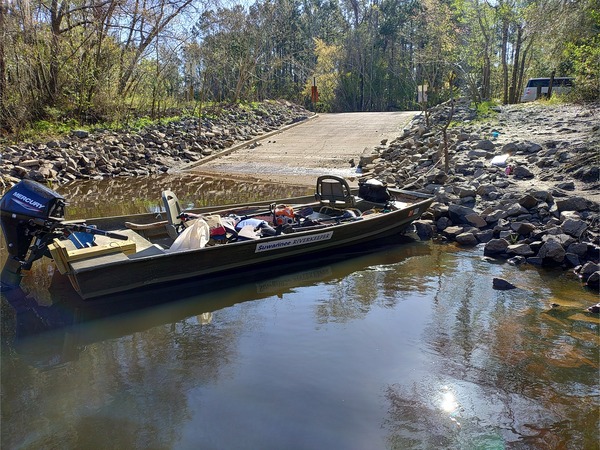 [Suwannee Riverkeeper jon boat and 9.9 hp outbard --Phil Royce, 2025:03:22 10:11:00]