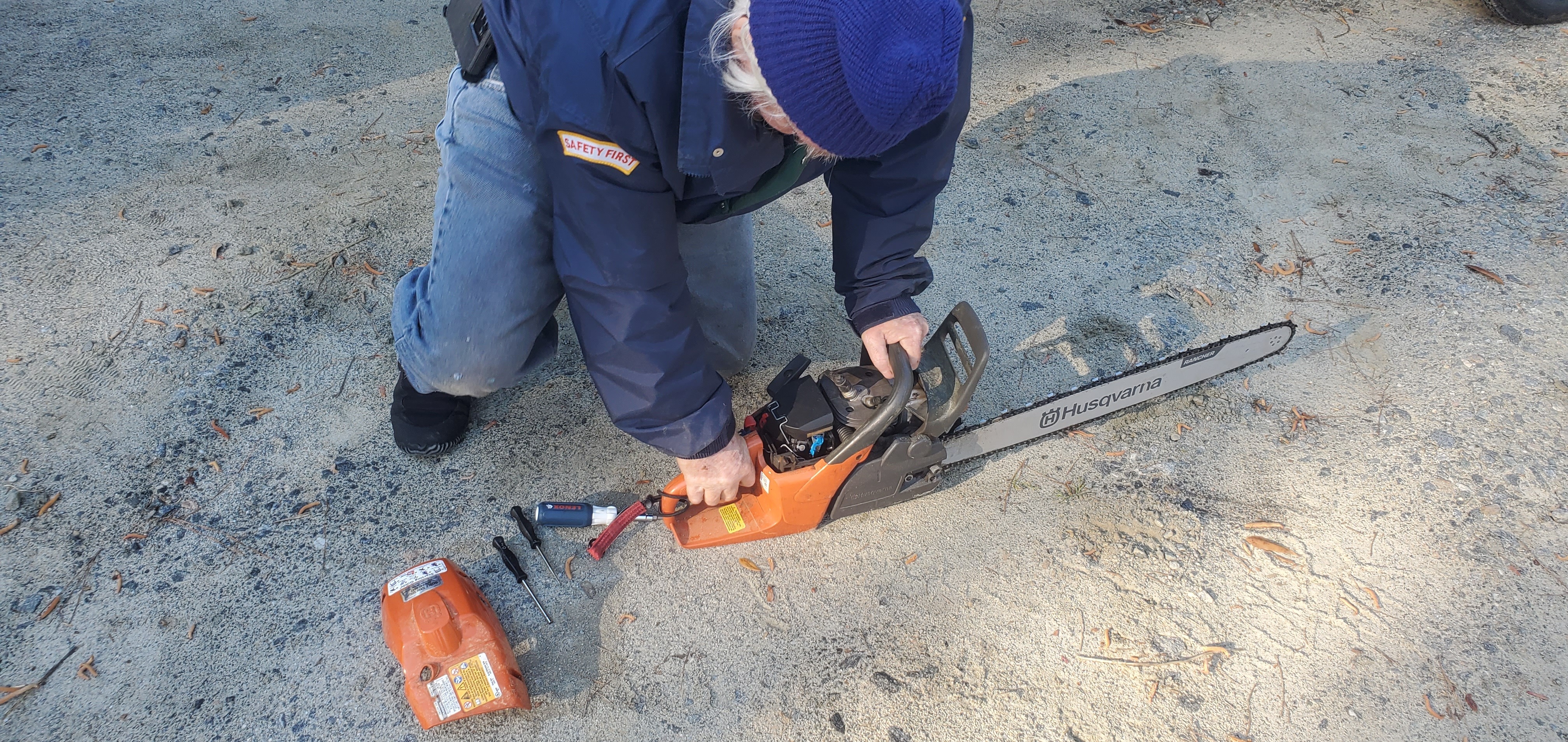 Phil Hubbard tuning the WWALS 24-inch Husqvarna 460 Rancher chainsaw, 2025:03:22 09:38:19, 30.8514314, -83.3466333