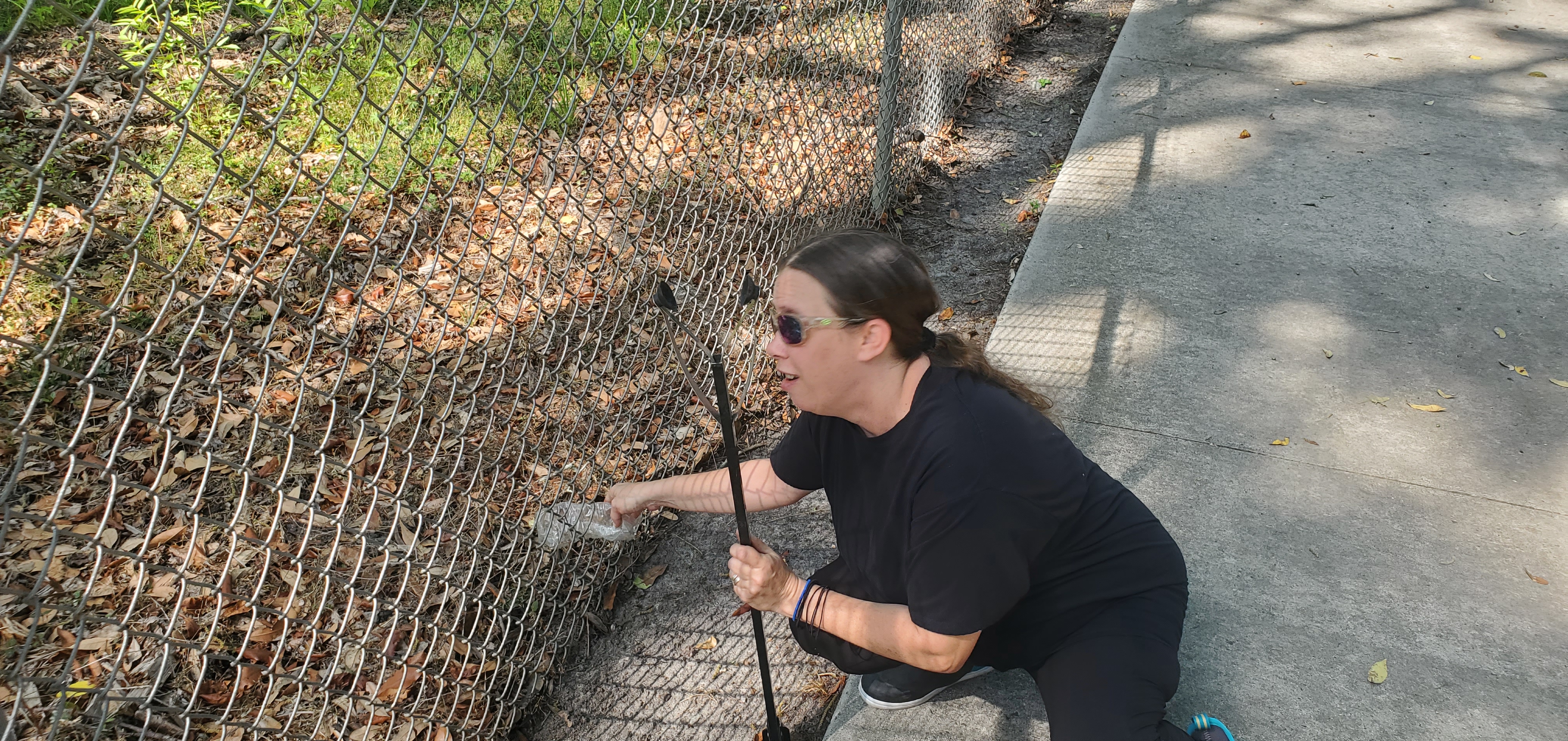 Pull trash through the fence, 10:29:42, 30.8428982, -83.3000206