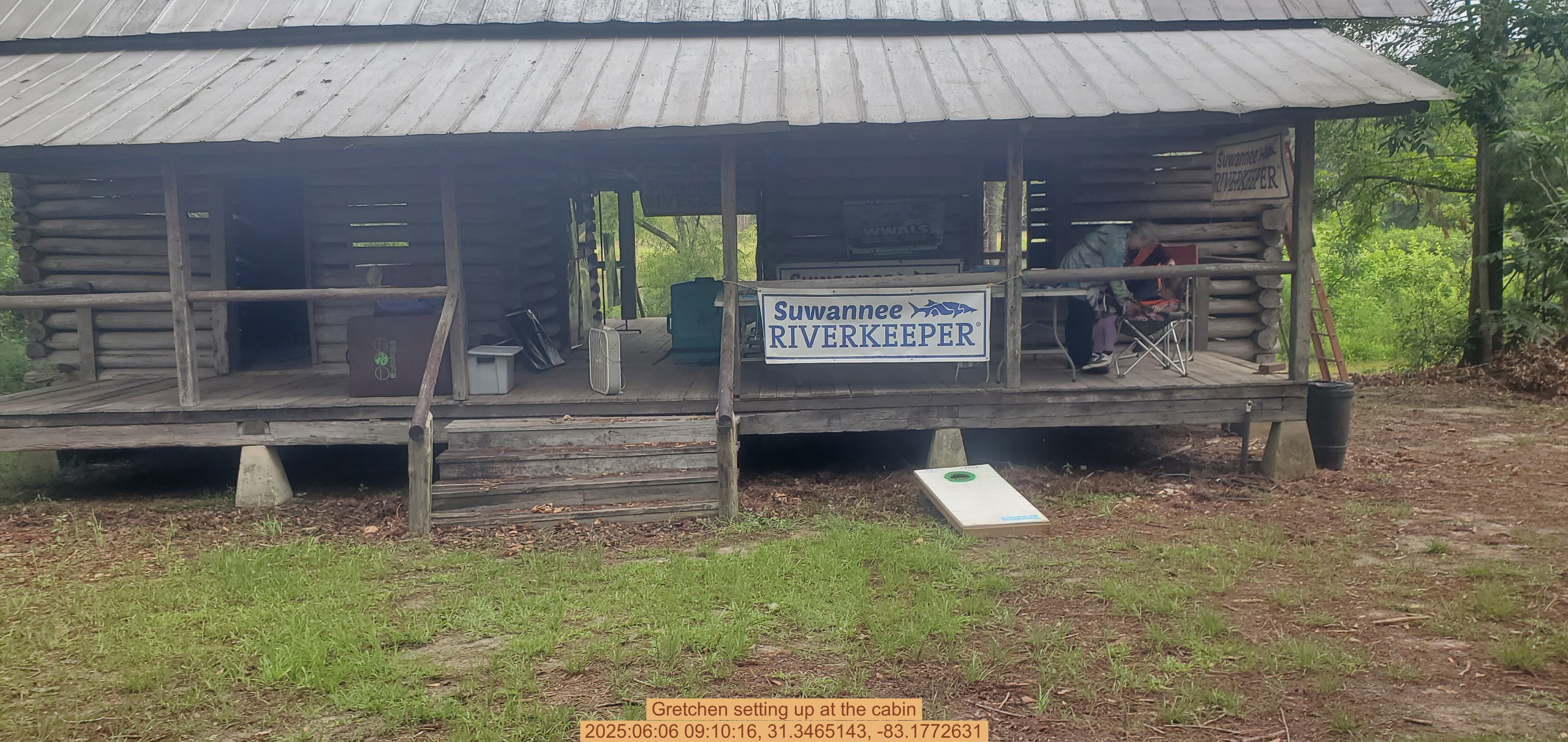 Gretchen setting up at the cabin, 2025:06:06 09:10:16, 31.3465143, -83.1772631