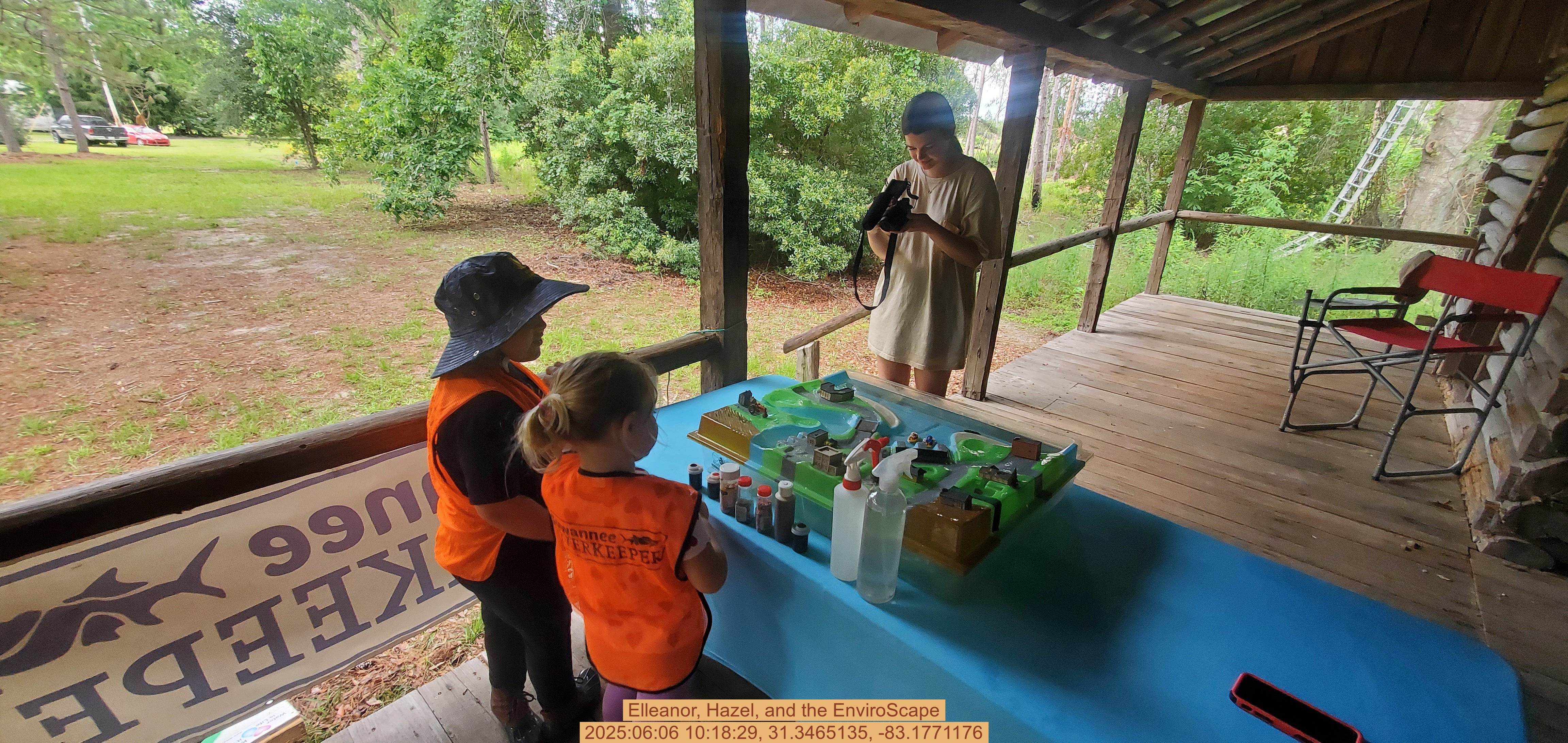 Elleanor, Hazel, and the EnviroScape, 2025:06:06 10:18:29, 31.3465135, -83.1771176