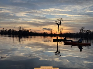 [Boats backlit by sunset, 2025-03-14 --Gretchen Quarterman for WWALS]