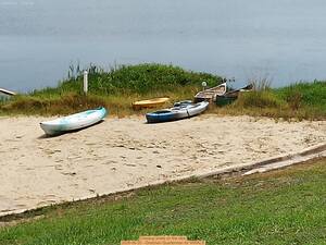 [Closeup boats on the lake, 2026-06-20 --Gretchen Quarterman for WWALS]