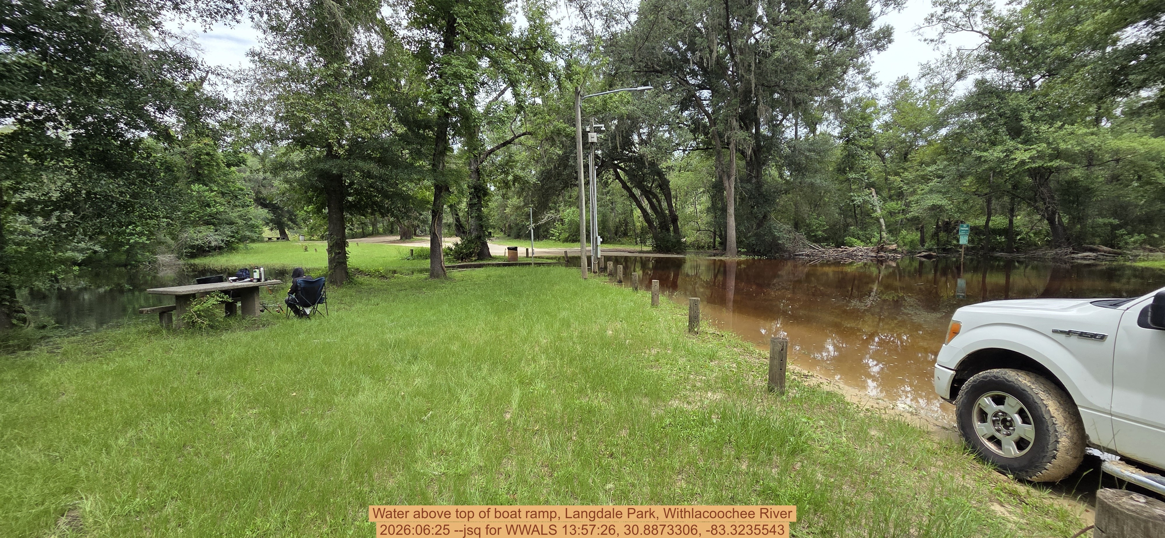 Water above top of boat ramp, Langdale Park, Withlacoochee River, 2026:06:25 --jsq for WWALS 13:57:26, 30.8873306, -83.3235543