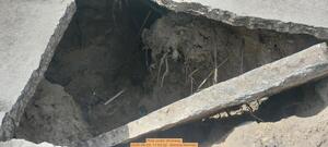 [Hole under driveway, 2026-06-04, 11:02:32 --Dennis Norman]