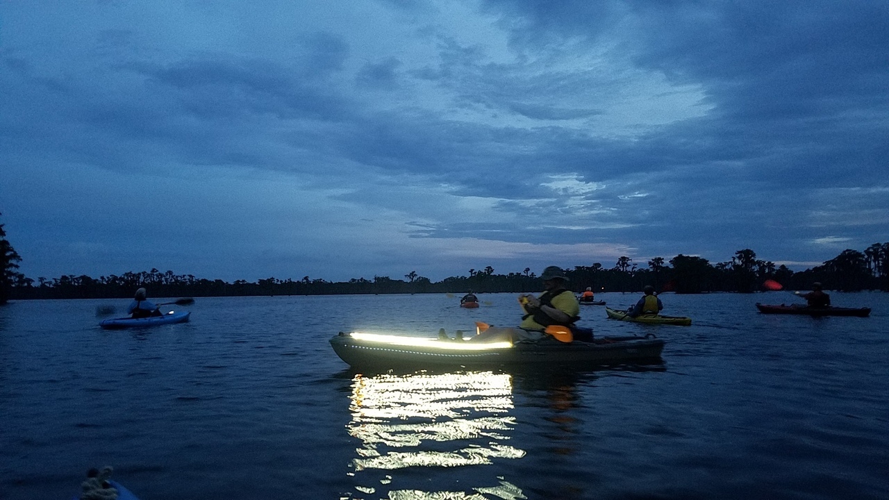 Paddling Banks Lake with lights at dusk