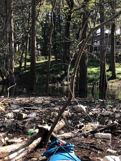 Garbage raft behind Wood Valley