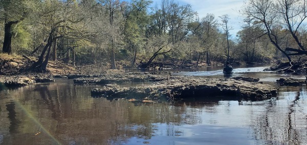 [Boat beyond rocks, 12:43:22, 30.6948206, -83.4425850]