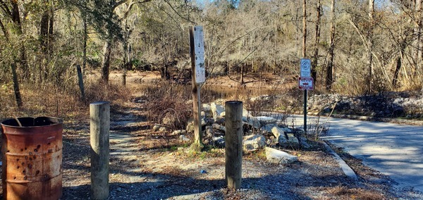 [Trash can, signs, Troupville Boat Ramp, Little River, 2023:01:06 13:55:29, 30.8513074, -83.3472345]