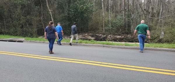 [Valdosta City Engineer Ben O'Dowd leads three GA-DNR to Two Mile Branch at Berkley Drive, 14:30:56, 30.8633106, -83.3018873]