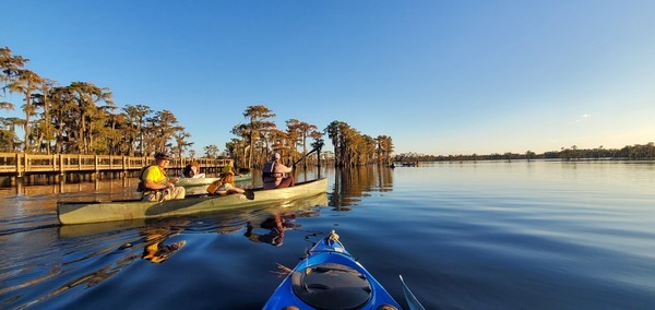 [Canoes by the fishing pier]