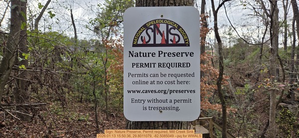 [Sign: Nature Preserve, Permit required, Mill Creek Sink, 2026:01:13 15:50:36, 29.8011079, -82.5085049 --jsq for WWALS]