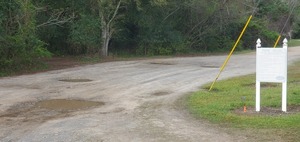 [Potholes at the entrance]