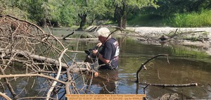 [Phil sawing more on the Langdale Park Boat Ramp Upstream Deadfall, 2025:07:22 10:30:37, 30.8872473, -83.3241202 --jsq for WWALS]