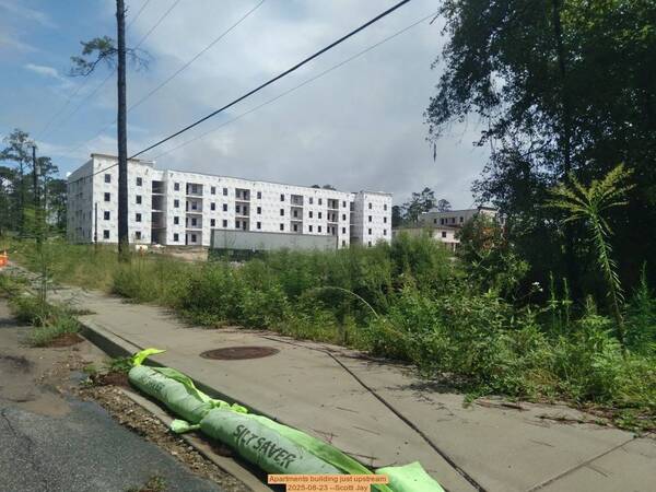 [Apartments building just upstream, 2025-08-23 --Scotti Jay]