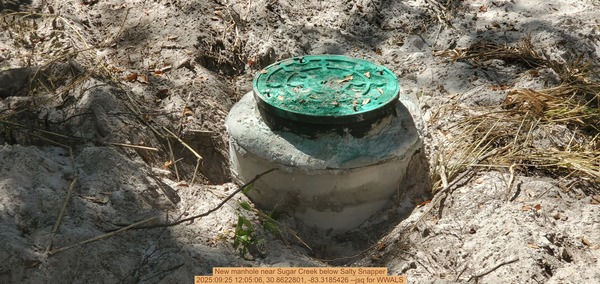 [New manhole near Sugar Creek below Salty Snapper, 2025:09:25 12:05:06, 30.8622801, -83.3185426 --jsq for WWALS]