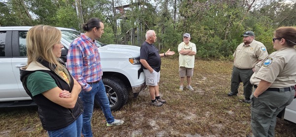 [Melanie and Paul Batts of VLPRA, Edwin McCook, Lowndes County Chairman Bill Slaughter, Nic Brown and Shell Cannon of Florida Parks, 2025:09:27 09:37:55 Dowling Park River Camp]
