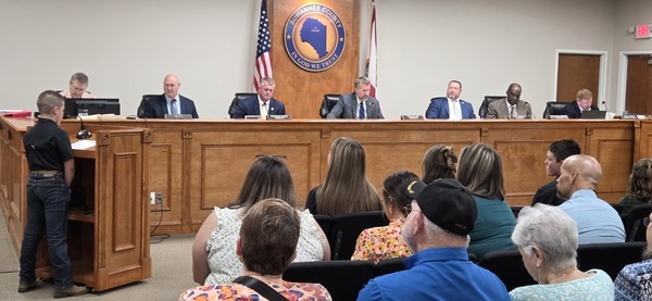 [Eric Musgrove, Clerk to Board; Don Hale, District 1; Franklin White, District 5; Travis Land, District 3 and Chairman; Leo Mobley, District 4; Maurice Perkins, District 2; County Attorney Adam L. Morrison; County Administrator Greg Scott off to the right, 2025-10-07 by jsq for WWALS]