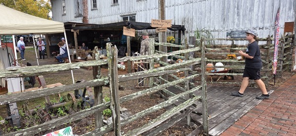 [Meanwhile, behind Suwannee Hardware]