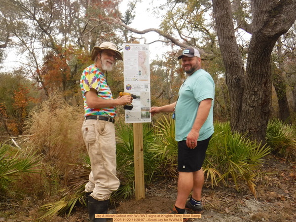 Jsq & Micah Cofield with WLRWT signs at Knights Ferry Boat Ramp, 2025:11:22 11:28:07 --Scotti Jay for WWALS