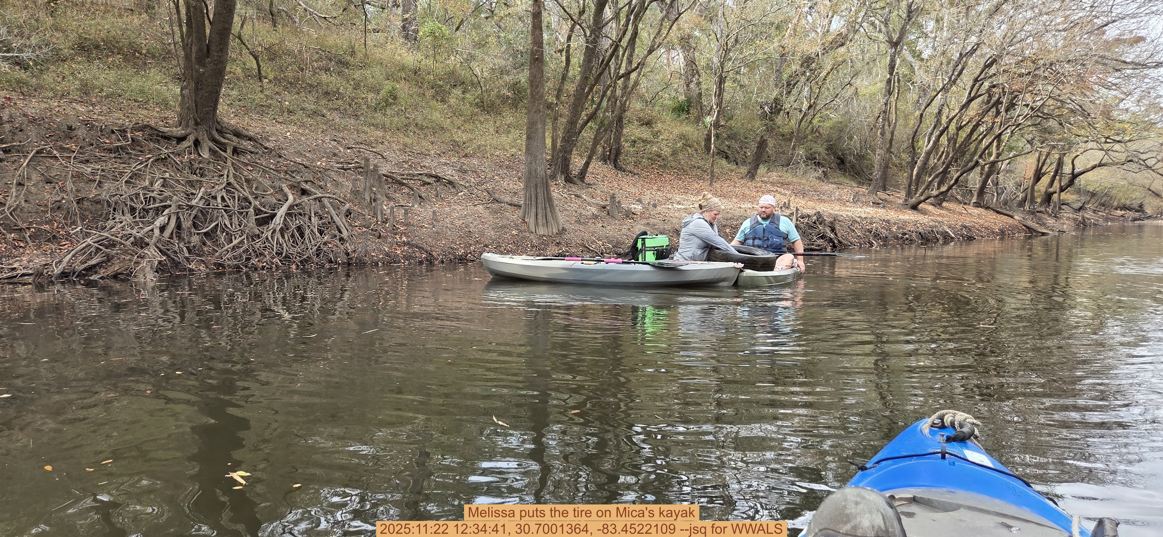 Melissa puts the tire on Mica's kayak, 2025:11:22 12:34:41, 30.7001364, -83.4522109 --jsq for WWALS