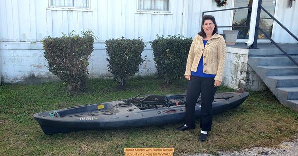 [Janet Martin with Raffle Kayak, 2025-12-12 --jsq for WWALS]