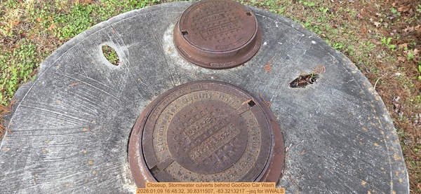 [Closeup, Stormwater culverts behind GooGoo Car Wash, 2026:01:09 16:48:32, 30.8311507, -83.3213217 --jsq for WWALS]